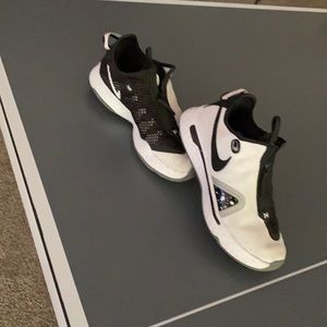 Paul George whir and black zip ups